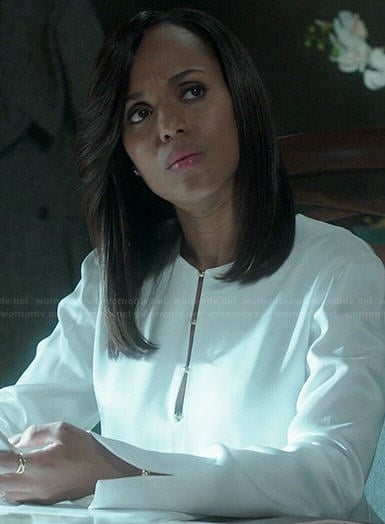 Olivia’s white long sleeved blouse with gold buttons on Scandal