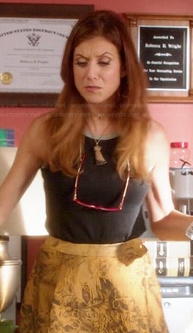 Rebecca’s gold jacquard skirt and black metallic trimmed tank top on Bad Judge