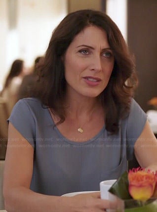 Abby’s blue short sleeve top on Girlfriends Guide to Divorce