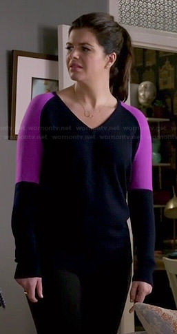 Annie's black and pink colorblock v-neck sweater on Marry Me