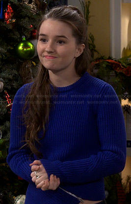 Eve's blue asymmetric zip sweater on Last Man Standing