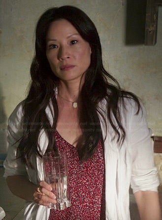 Joan's red speckled print two-tone dress on Elementary