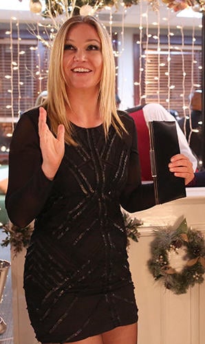 Jessica (Julia Stiles)’s black long sleeved sequin mini dress on The Mindy Project