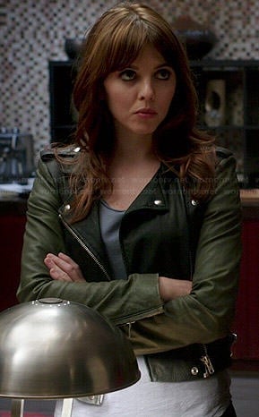 Kitty’s leather jacket with green sleeves on Elementary