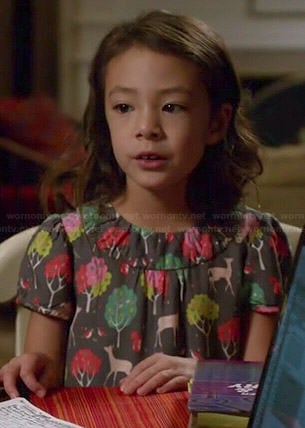 Lily’s deer and forest printed dress on Modern Family