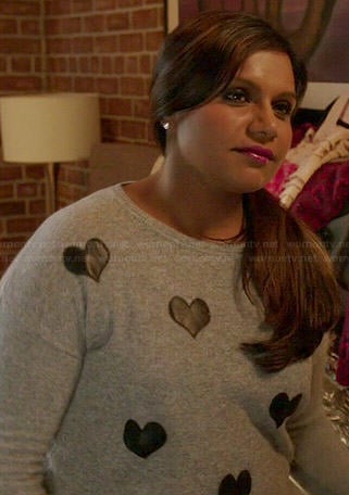 Mindy’s grey sweater with leather hearts on The Mindy Project