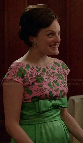 Peggy’s pink and green floral embroidered gown with bow on Mad Men