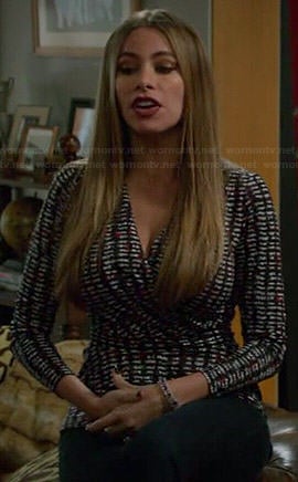 Gloria's black, white and red printed wrap top on Modern Family