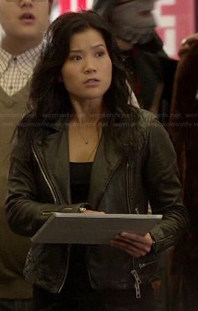 Happy’s black leather jacket with zip waist on Scorpion