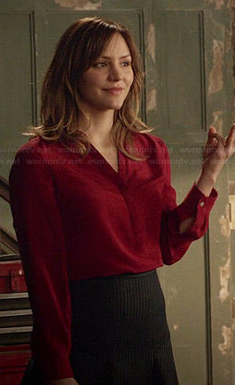 Paige's pinstriped fluted skirt and red blouse on Scorpion