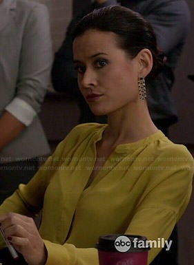 Raquel’s yellow split-neck blouse on Chasing Life