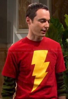 Sheldon’s red Captain Marvel Shazam! symbol shirt on The Big Bang Theory