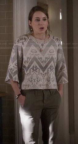 Spencer’s white lace cropped sweater with zig zag pattern on Pretty Little Liars