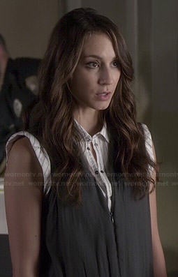 Spencer’s navy zip front jumpsuit and striped sleeveless top on Pretty Little Liars