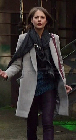 Thea's grey coat, blue leopard print top and buckled scarf on Arrow