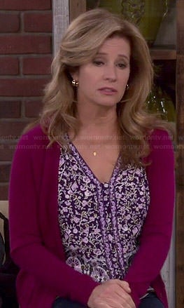 Vanessa’s purple floral v-neck top on Last Man Standing