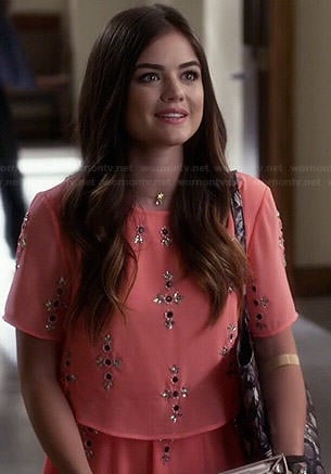 Aria's coral embellished crop top and skirt set and chocolates printed tote bag on Pretty Little Liars