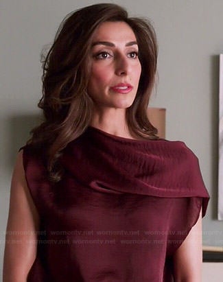 Delia’s burgundy draped neck blouse on Girlfriends Guide to Divorce