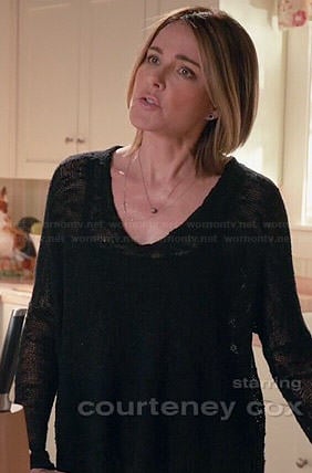 Ellie’s black textured sweater on Cougar Town