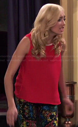 Emma's red beaded top and printed jeans on Jessie