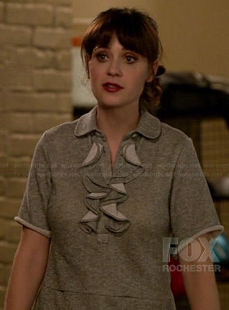 Jess's grey ruffled front polo top on New Girl