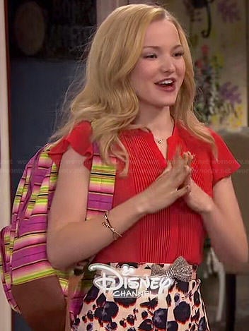 Liv’s red pintucked blouse and floral skirt on Liv and Maddie