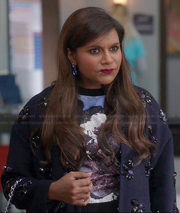 Mindy's navy jewelled coat and mountain graphic top and skirt on The Mindy Project