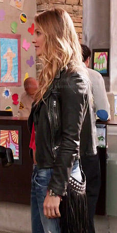 Phoebe’s leather jacket and fringed bag on Girlfriends Guide to Divorce