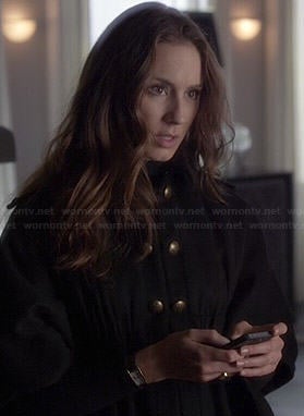 Spencer’s black cape with gold buttons on Pretty Little Liars