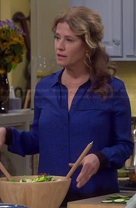 Vanessa’s blue and black printed blouse on Last Man Standing