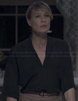 Claire’s black v-neck boxy blouse on House of Cards