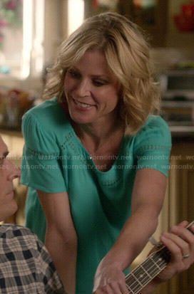 Claire's green eyelet trim top on Modern Family