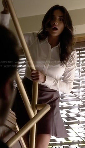 Emily’s white button down shirt and burgundy leather skirt on Pretty Little Liars