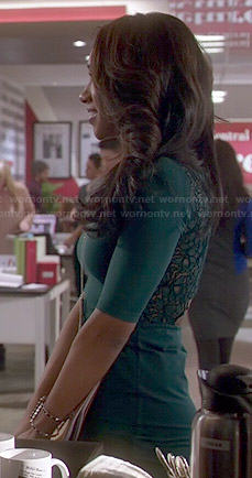 Iris's green lace back mini dress on The Flash