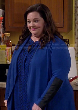 Molly’s blue cardigan with leather sleeves on Mike and Molly