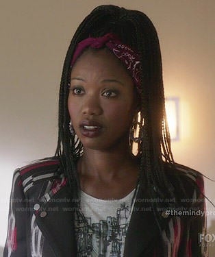 Tamra's black and red painted striped moto jacket on The Mindy Project