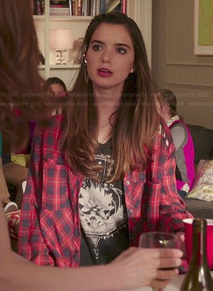 Xanthippe’s open back graphic print top and plaid shirt on Unbreakable Kimmy Schmidt