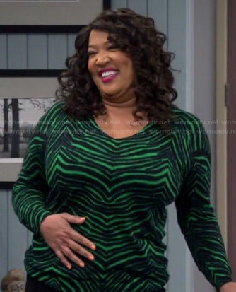 Yolanda's green zebra print sweater on Young and Hungry