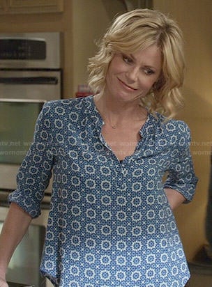 Claire’s blue tile printed blouse on Modern Family