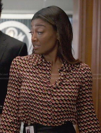 Daisy's pink and yellow printed blouse on Madam Secretary