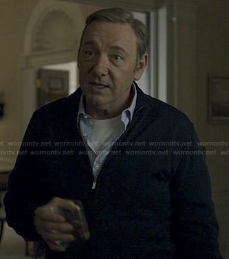 Francis's blue checked shirt and black zip front cardigan on House of Cards