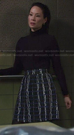 Joan's blue and black textured print skirt on Elementary