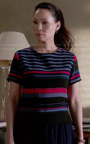 Joan's blue and red striped top on Elementary