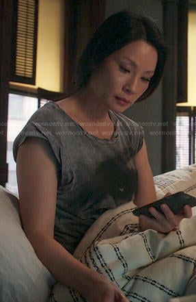 Joan's grey eye tee on Elementary