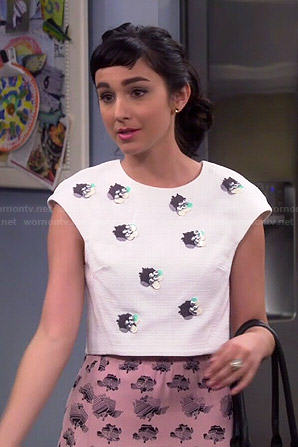 Mandy's white embellished crop top and pink skirt on Last Man Standing