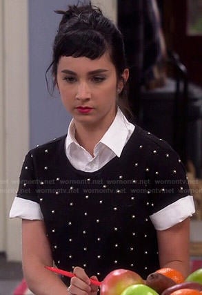 Mandy's black pearl studded top on Last Man Standing