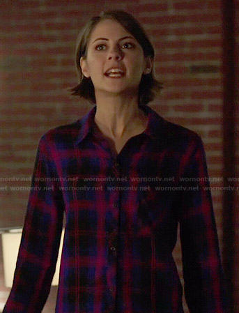 Thea’s blue and red plaid shirt on Arrow