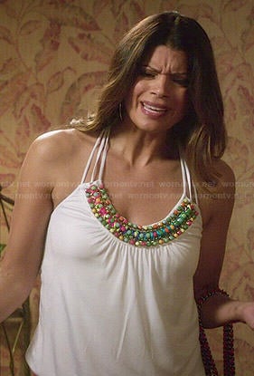 Xiomara’s white beaded neck top on Jane the Virgin