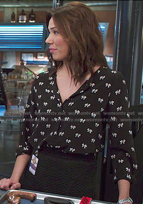 Angela's black bow print blouse on Bones
