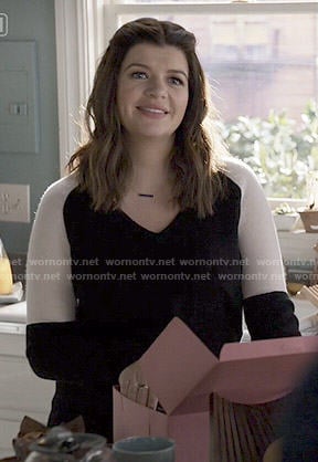 Annie's black and white colorblock sweater on Marry Me